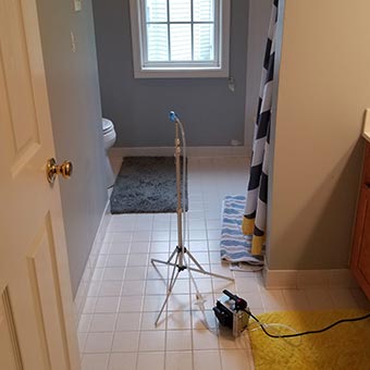 Taking sample during mold testing process in bathroom, Germantown, 20874